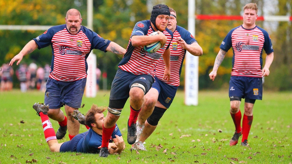 Isaac Dobbs looks to make a break. Image courtesy of Tim Abram