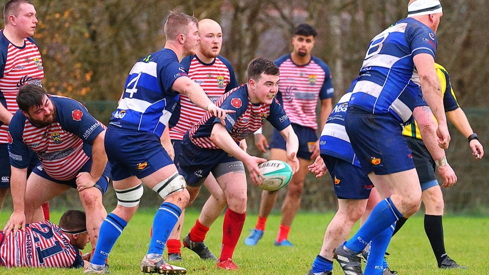 Oldham's Lewis Ward is pictured in the thick of the action. Image courtesy of Tim Abram