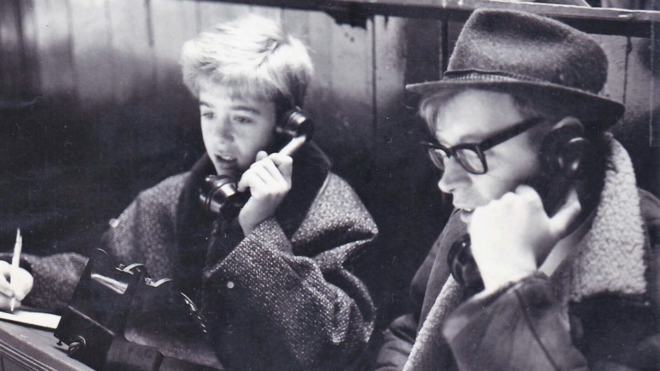 It's 1971 and 14-year-old Alan Buke, later to become well known as a Rugby League referee, is pictured watching an Oldham game with the then Chronicle reporter Roger Halstead. Image courtesy of ORLFC