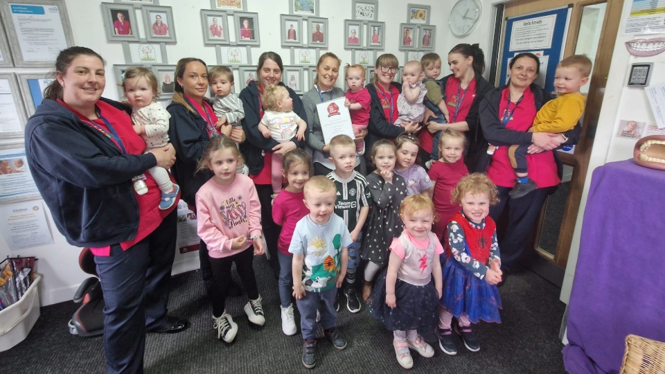 Children and staff at the Buttercup Corner Day Nursery