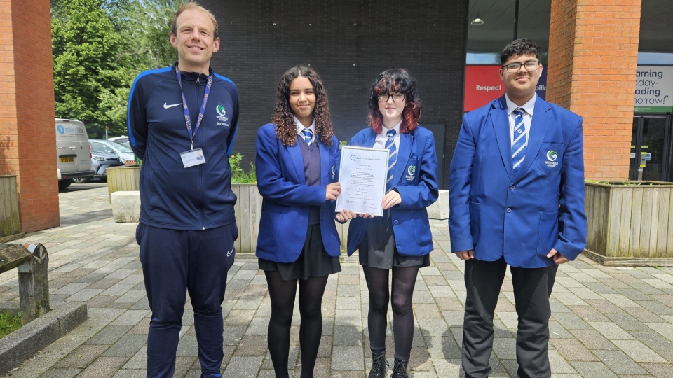 Pictured with the Quality in Careers Standard Award are Neil Wilson, Assistant Principal, Personal Development, Kashif, Y10, Rhiannon, Y10 and Allyha, Y10