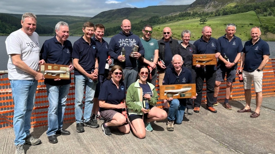 Pictured (from left) are: Tim Allen, Iain McNeill, Michael Harris, Andrew McKee, Rich Jones, Chis Massey, Ian Hockey, Anne Webb, David McKee, Mal Hartland crouching Sarah Harris, Val Hockey and Graham Massey