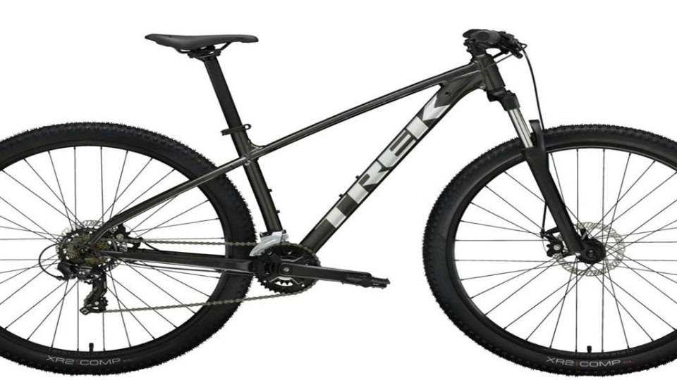 The bike - similar to this one - is a black Trek pedal bike