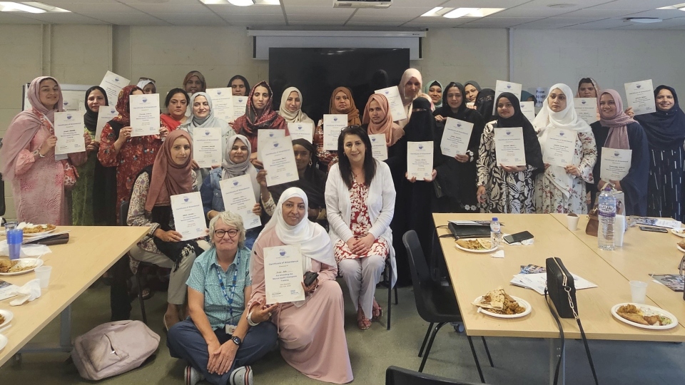 Pictured are local women receiving their certificates