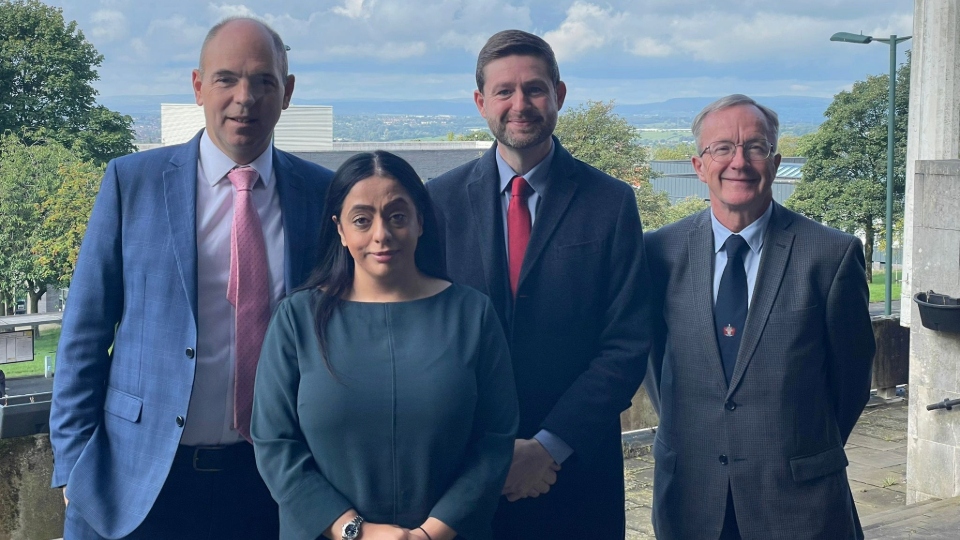 Pictured are Eton head, Simon Henderson, Oldham council leader Arooj Shah, Oldham West and Royton MP Jim McMahon, and council chief executive Harry Catherall. Image courtesy of UGC/LDRS