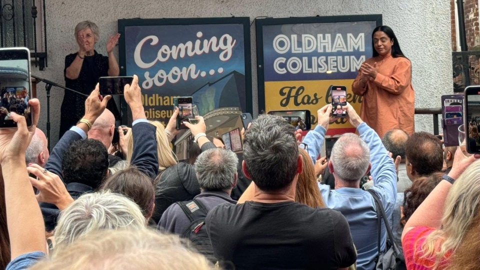 The crowd clapping at last night's poster unveiling