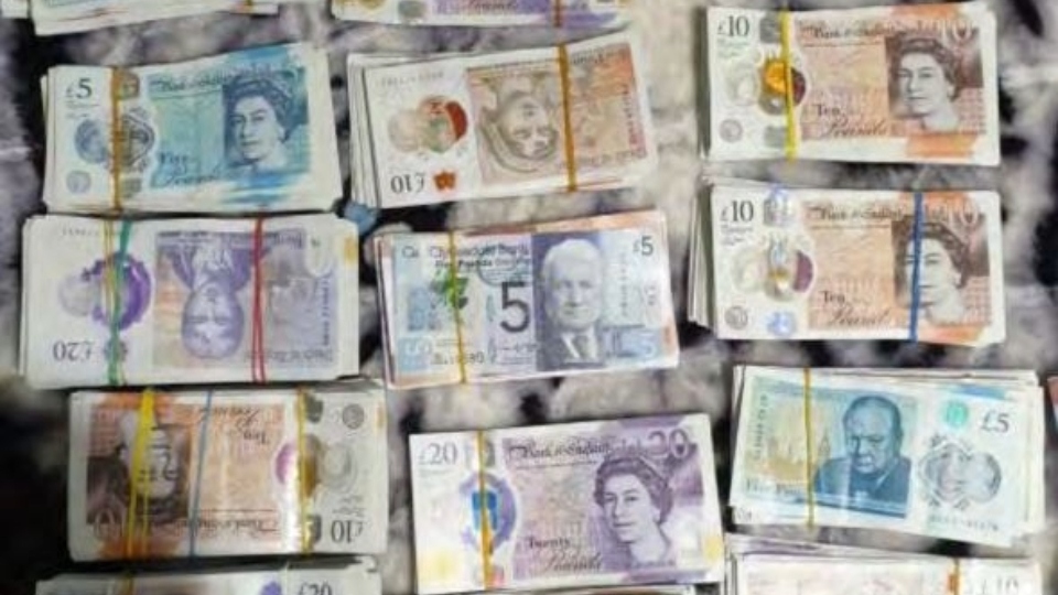 Some of the cash seized following the police stop incident in Oldham. Image courtesy of GMP