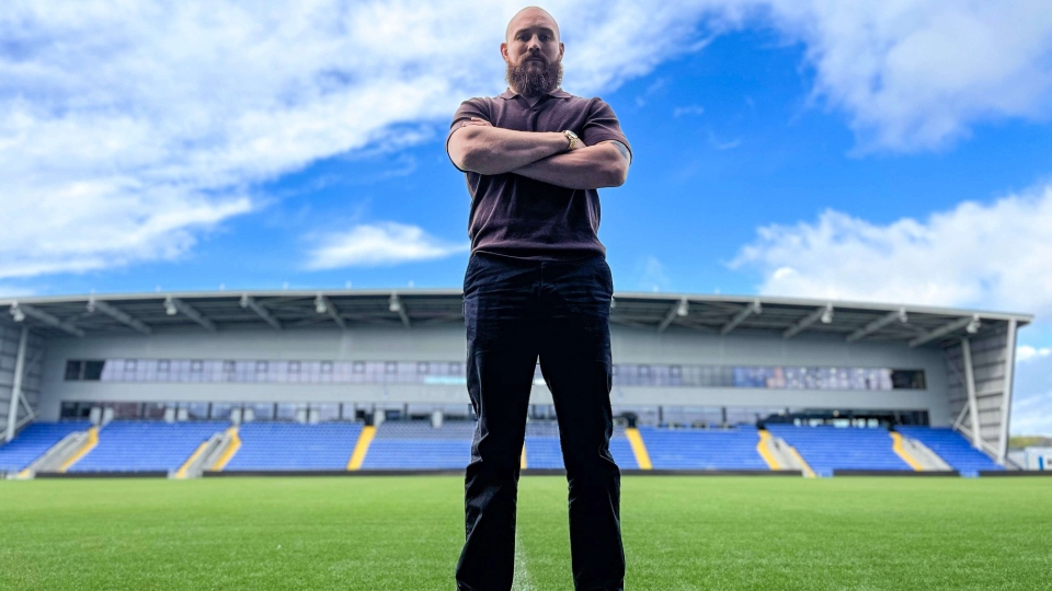 Gil Dudson pictured at Boundary Park. Image courtesy of ORLFC