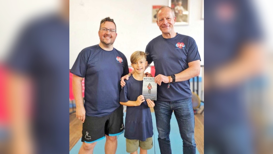 Scott Woodhead from Sports Physio UK is pictured with his son Charlie at the fund-raiser, alongside Steve Hill MBE, who also took part in the CPR marathon