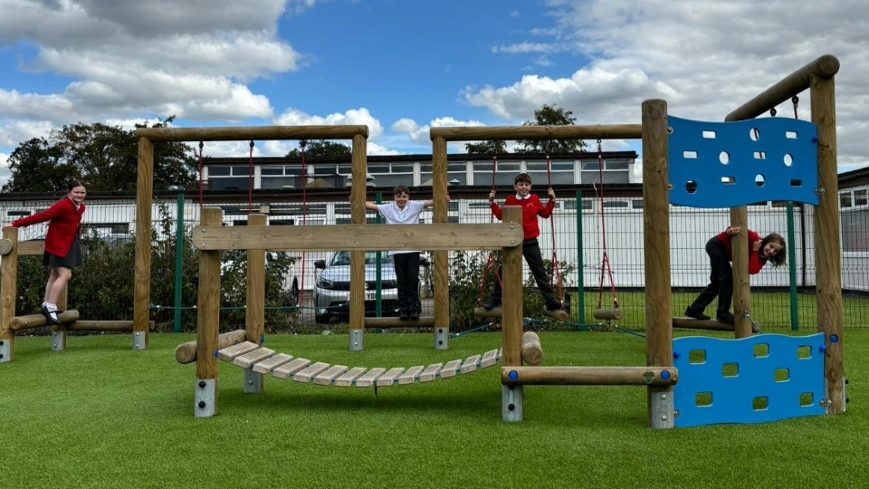 South Failsworth Primary School pupils enjoy their new climbing frame equipment