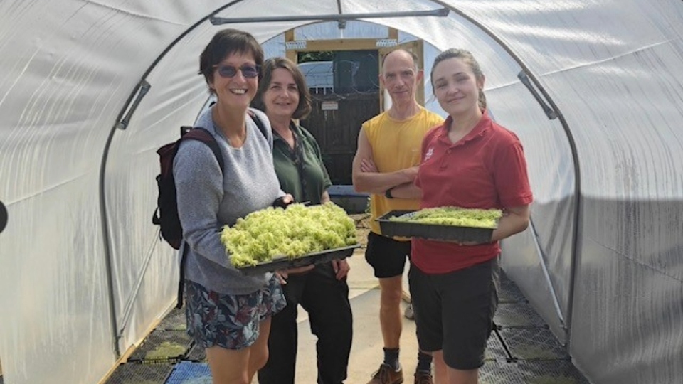 Pictured is ranger Francesca Bray with nursery volunteers and members of the Calderdale Sphagnum Project