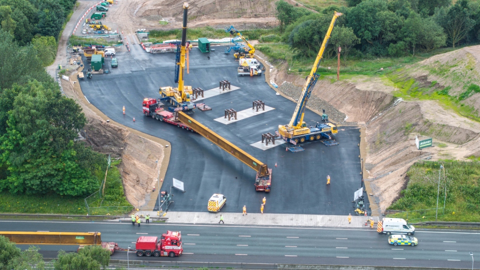 An aerial shot of the beams arriving on the worksite just next to the M62 motorway. Image courtesy of Network Rail