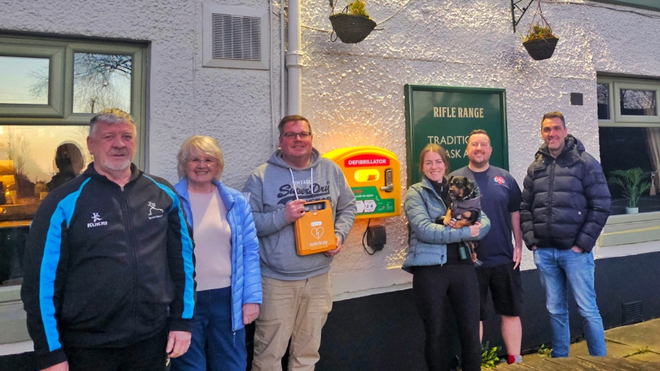 Defibrillators Save Lives committee members and trustees pictured outside the Rifle Range pub in Chadderton