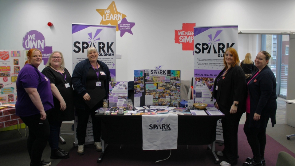 The team pictured at a previous SPARK Oldham event