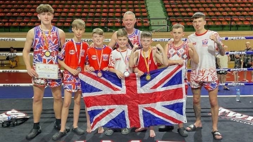 Isaan head coach Ste Donnelly is pictured with his team in Bangkok