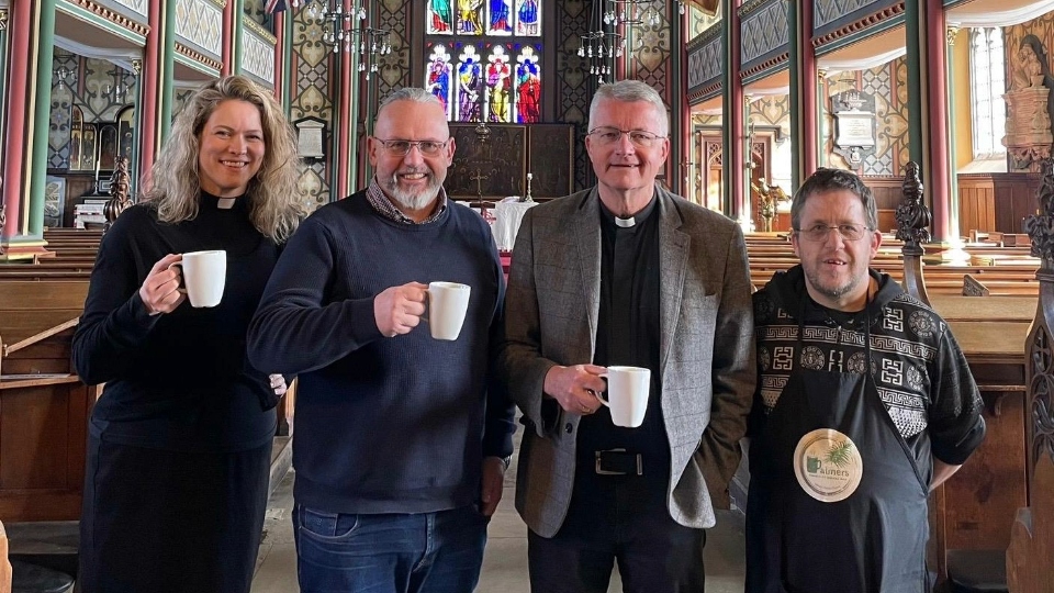 Pictured are Revd Hannah Currin, Matt Ramsbottom, Father Daniel Burton and OPC cafe volunteer Tony Haywood