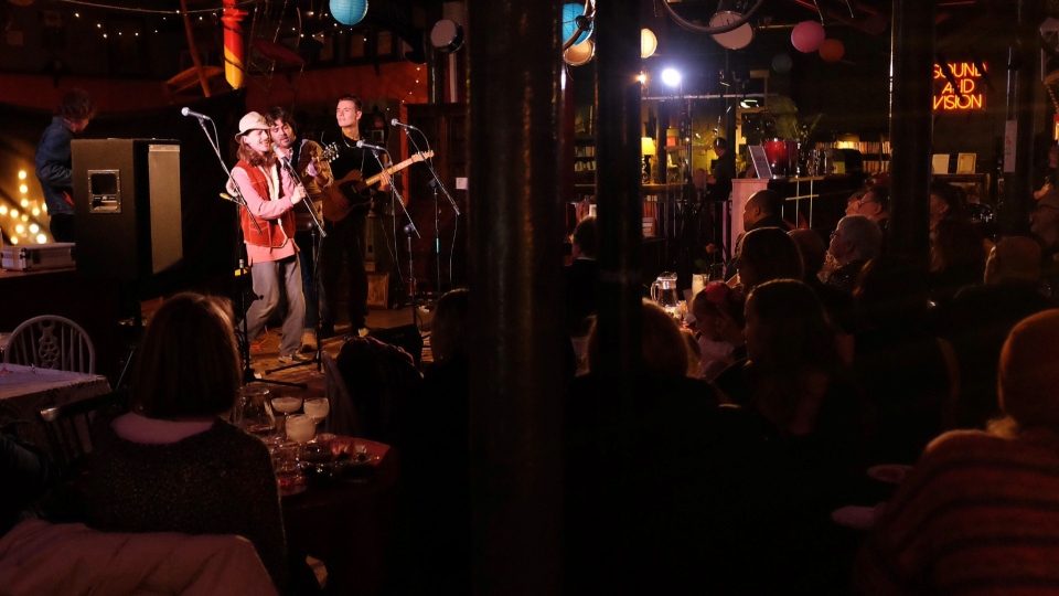 Local band Madame Claude on stage at the Viva Las Emmaus Cabaret