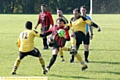 GOING FOR IT: Limeside King George’s Will Buckley (centre) is challenged by two Coppice players.