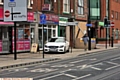 OUT of order . . . a Mercedes driver parks on the pavement