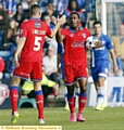 Dominic Poleon celebrates with James Wilson