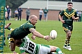 HEADING FOR A FALL . . . Chris Carter (left), of Oldham St Anne’s, attempts to pick out a team-mate.