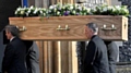 The coffin of former Labour MP Michael Meacher is carried into St Mary's Church in Wimbledon, London, ahead of his funeral.