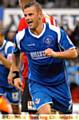 Richie Wellens wheels away after scoring his 1st, and Latics 3rd, goal of the afternoon.