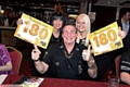 THUMBS UP FOR OLDHAM . . . Bobby George with local darts player Rachel Mawdsley (left) and Angi Taylor at the Night of Champions. PICTURES by TIM BRADLEY.
