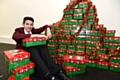 Christmas message: Kevin Kociu with some of the shoeboxes collected at Hathershaw College