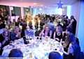 Guests enjoy the Christmas atmosphere at the event centre in the North Stand.