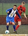 GOING FOR GOAL: Hollinwood’s Jamie Moore leaves an opposition defender trailing in his wake at Chapel Road.