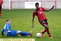 GO FOR IT . . . Chadderton’s Leon Iloube (right) leaves a defender trailing in his wake.