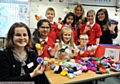 GET KNITTING: Pupils from Knowsley Junior School and their woolly goods. Rear l-r Billy Midgley, Sana Rashid, Ellen Aldred (assistant head), Emily Saville and Jade Phillips (Charity Co-ordinator). FRONT: Nicola Shore (Age UK Oldham), Ria Rashid, Emily Moule and Ben Saville.

CONTACT Jade Phillips (Charity Co-ordinator) art school.