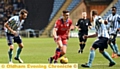 LOOKING FOR AN OPENING . . . lone striker Jake Cassidy tries to carve a chance for himself. Pictures by ALAN HOWARTH
