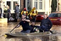 FLOODS devastated Cumbrian towns and villages