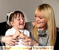 FUNDRAISING hope: little Olivia with mum Christie. 