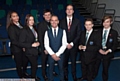 Simon (centre) with principal Nigel Whittle (right), academy council chairman Craig Dean and pupils (from left) Kara Steele, Jessie Holland, Tom Price and Ben Bardsley.