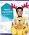 Nick Grimshaw posing on his charity Christmas card