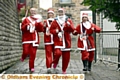 ON the run . . . Santa dash runners (from the left) Claire Breen, Carol Price, Melanie Whittle and Gabriella Maragioglio.
