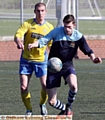 IN CONTROL . . . Hollinwood’s Callum Neville (right).
