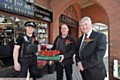 TONY on tour . . . Tony Lloyd with PC Paul Rainsford and local florist Dale Robinson