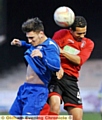 Saul Ashworth (left, Oldham Boro) and Ben Greenidge (Chadderton) tussle during the one-sided game