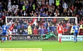 PAYING THE PENALTY: Athletic go two goals down as Tom Bradshaw sends Joel Coleman the wrong way with his spot-kick. 