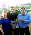 Reece Hunt (centre) with Bryan and Eve Townson of the Eagle and Child pub, Ramsbottom