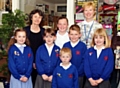 WELCOME . . . Baroness Estelle Morris with head teacher Suzanne Ashton and pupils.