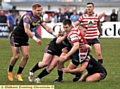 TAKE-DOWN: Outstanding Oldham man Phil Joy goes to ground during his side’s big win. 