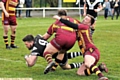 over i go: Dale Lowe dives in for Saddleworth Rangers against Wigan St Judes. 