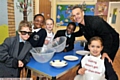 TOP chefs in the making: MasterChef winner Simon Wood at Christ Church Primary School (l-r) Joe Smedley, Estelle Mushiko, Lilia Evans, David Omodele, Simon Wood and Simon’s daughter Charlotte