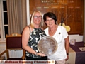 ALL YOURS: Tracey Rowbotham (left) receives the Marie Hufton Salver from lady captain Kay Broughton.