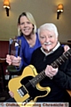 FUNDRAISER of the year . . . John Loydon (JSL) with his Fundraiser of the Year award from NMO Spectrum UK and Granby Arms landlady Deborah Hardie